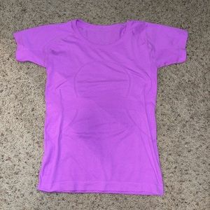 Light pink/purple lululemon short sleeve shirt
